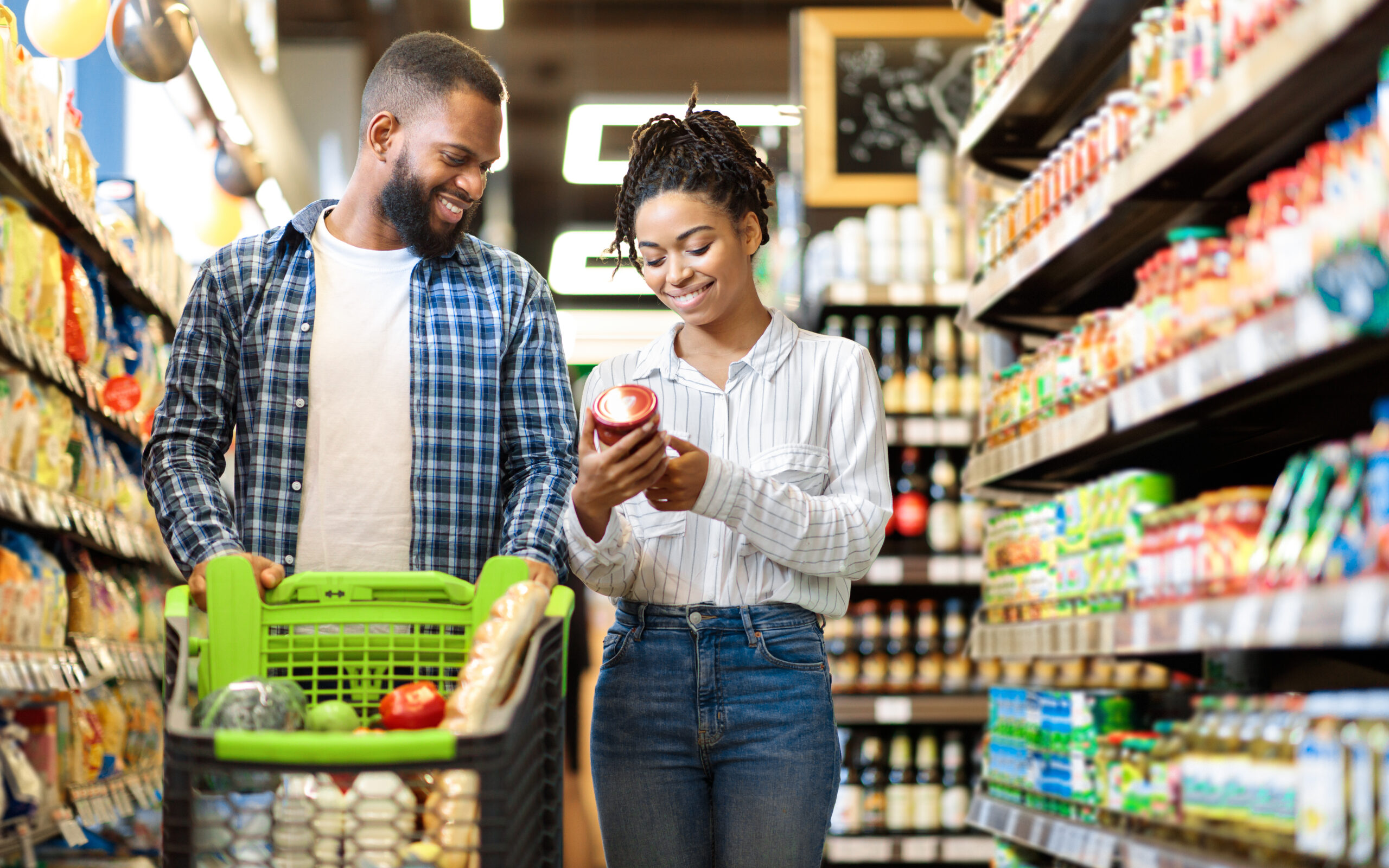 African,Family,Buying,Food,In,Supermarket,Shop,Walking,Pushing,Cart